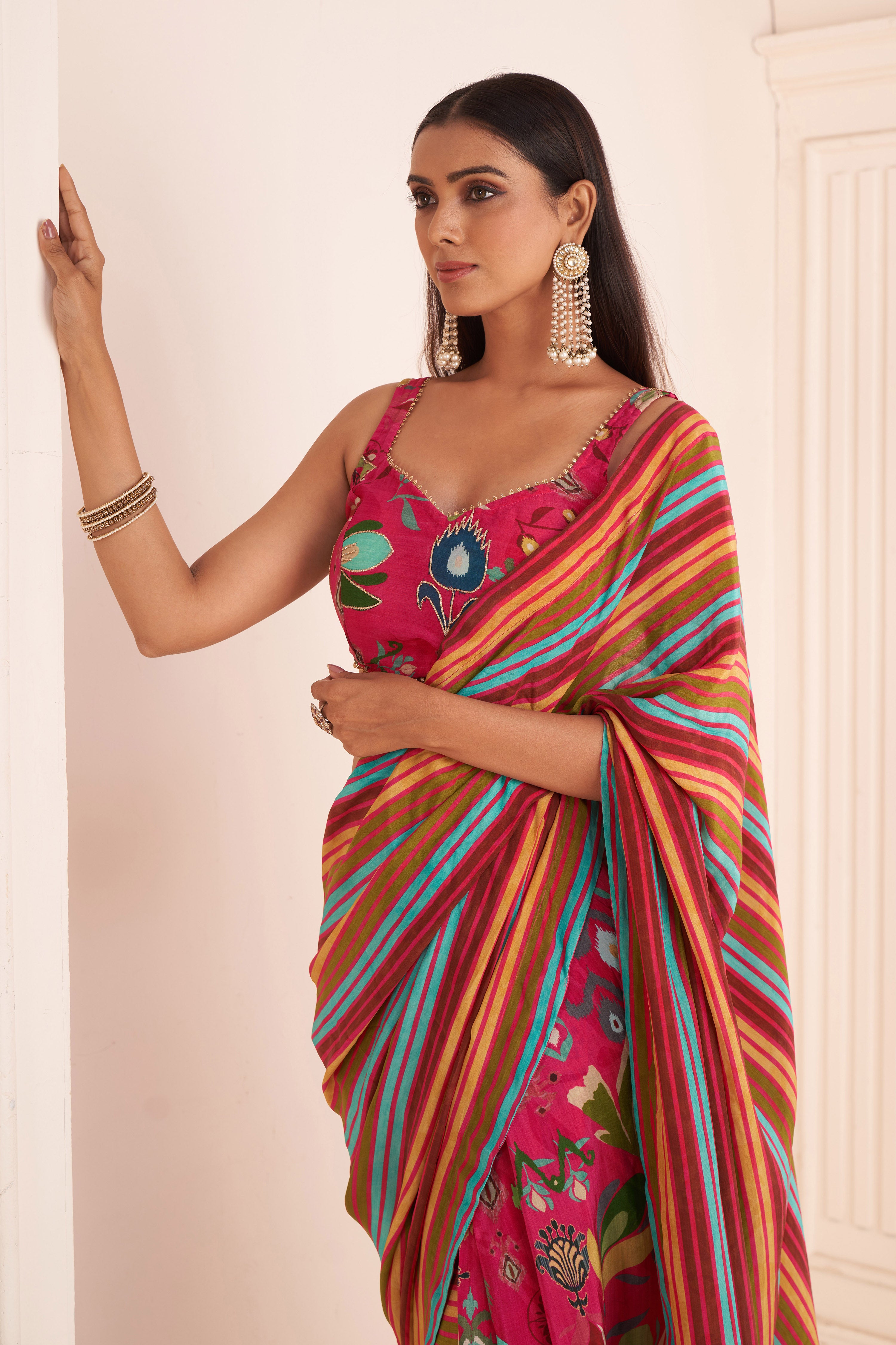 Pink Striped Pre Drape Saree With Embroidered Bustier