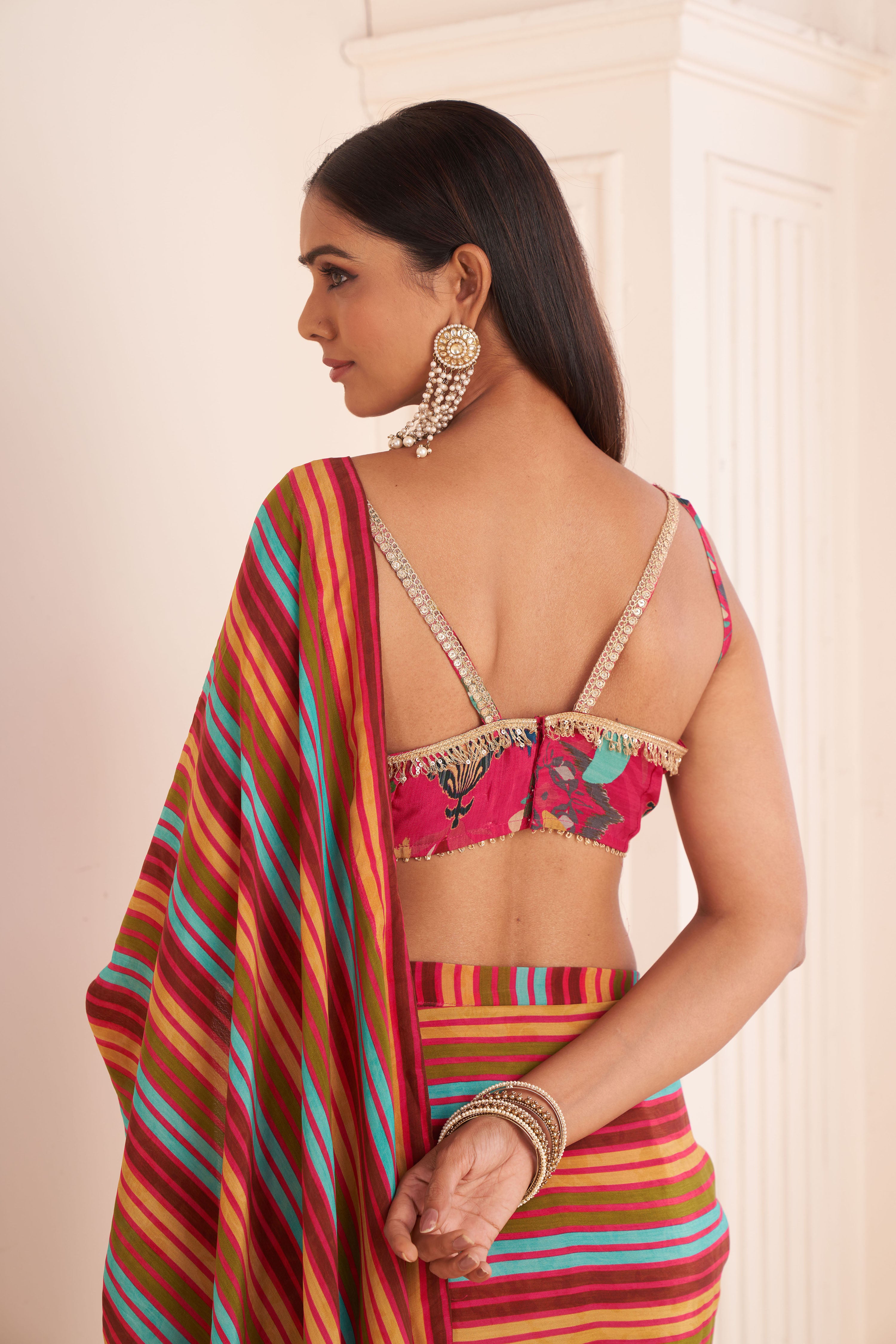 Pink Striped Pre Drape Saree With Embroidered Bustier