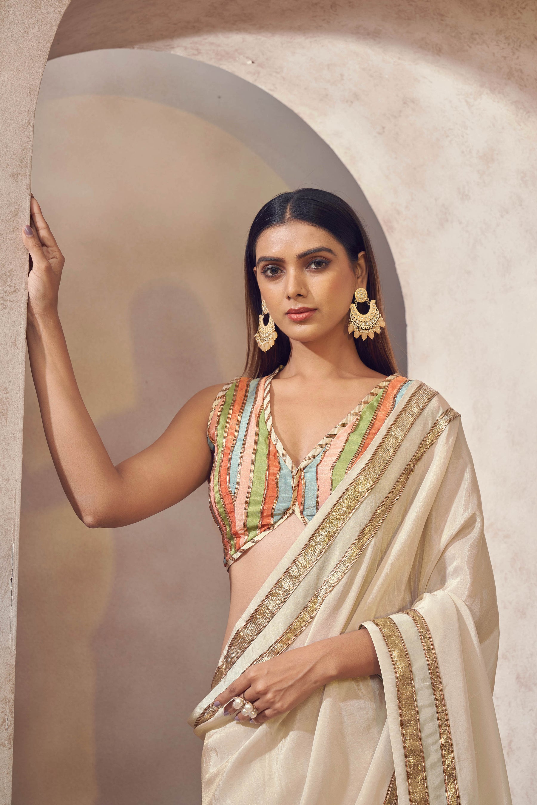 Sunehri Tissue silk saree with multicolored blouse