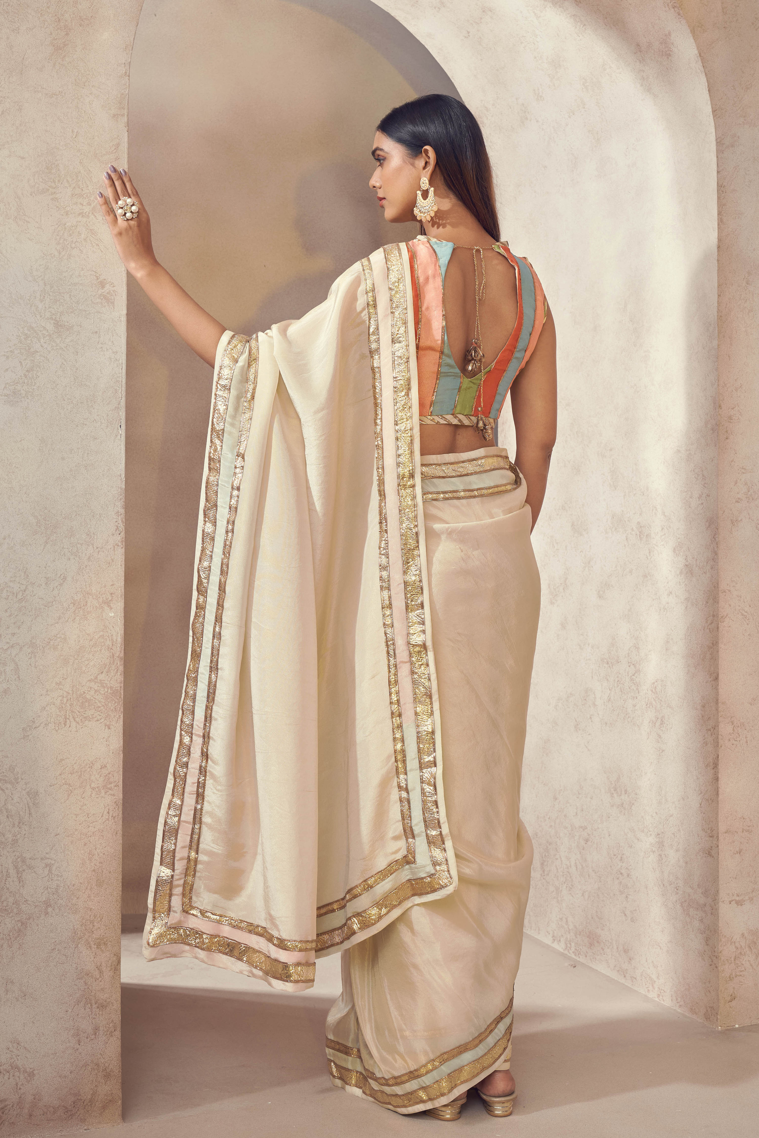 Sunehri Tissue silk saree with multicolored blouse