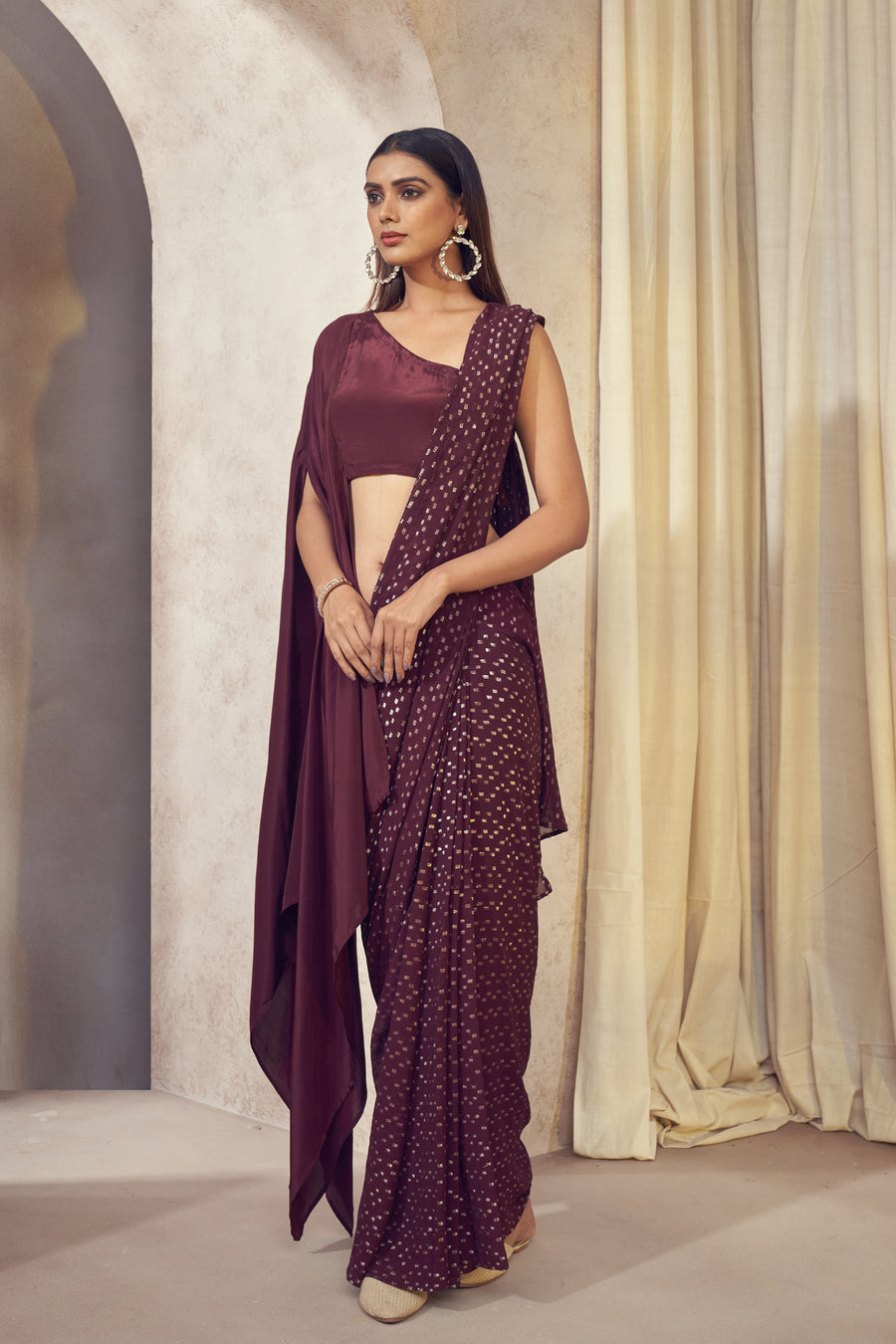 Sitaara wine saree with asymmetrical cape blouse