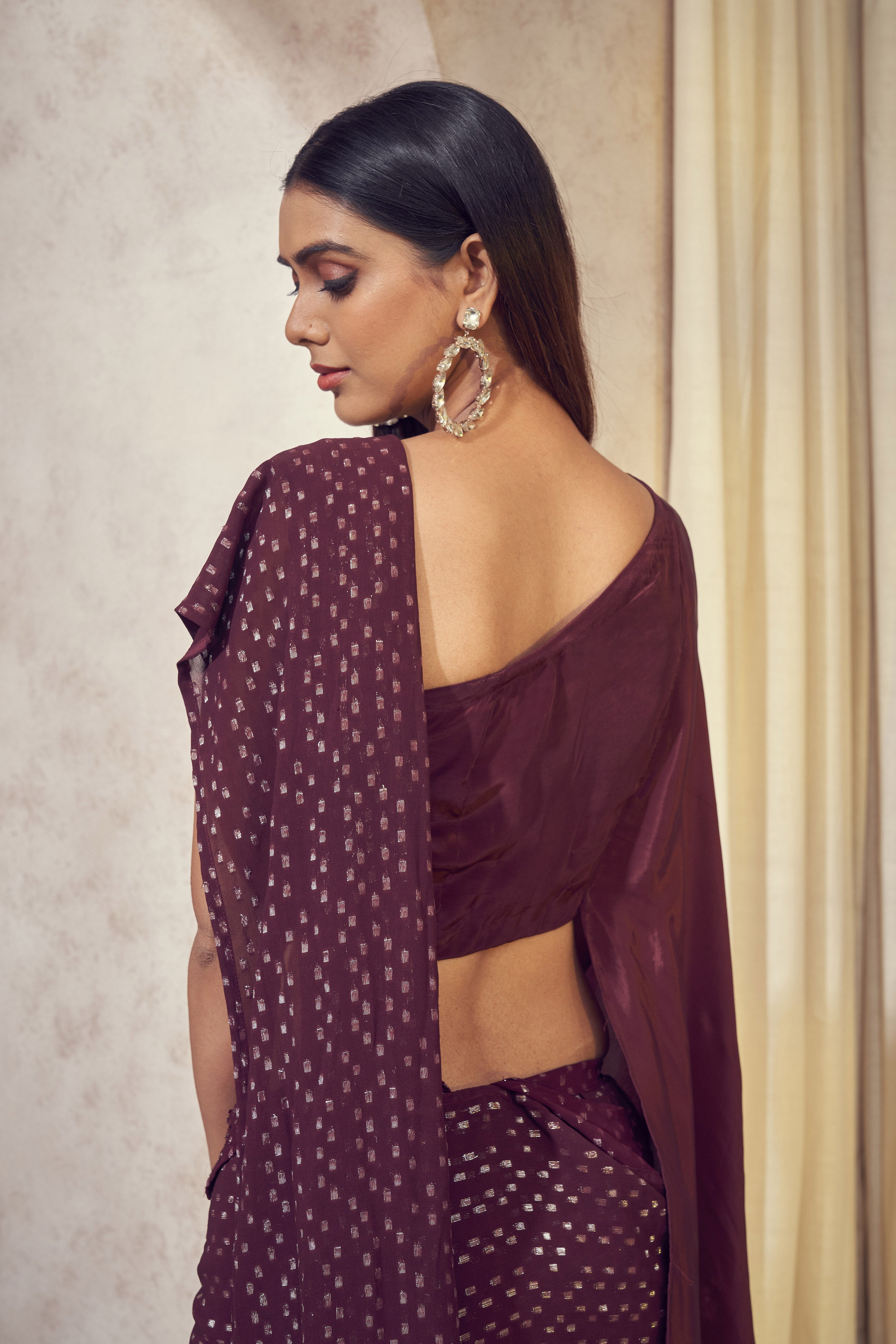 Sitaara wine saree with asymmetrical cape blouse